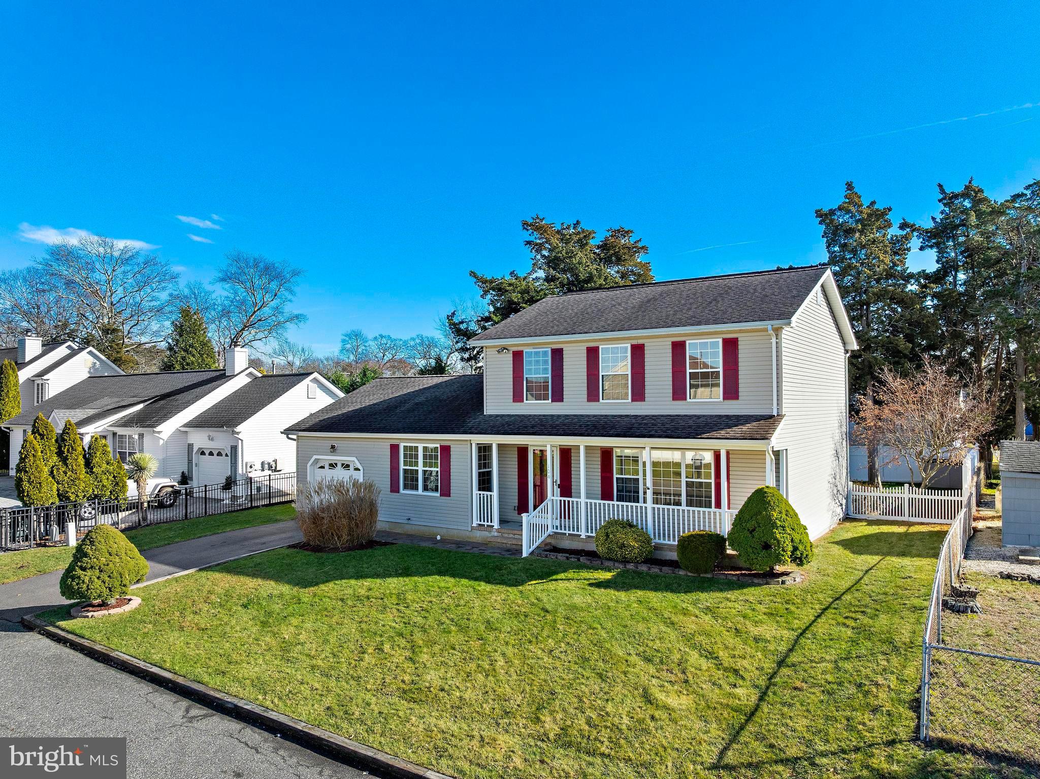 104 Greenwood Lake Road Little Egg Harbor, NJ 08087 - Photo 3 of 43 a front view of a house with garden