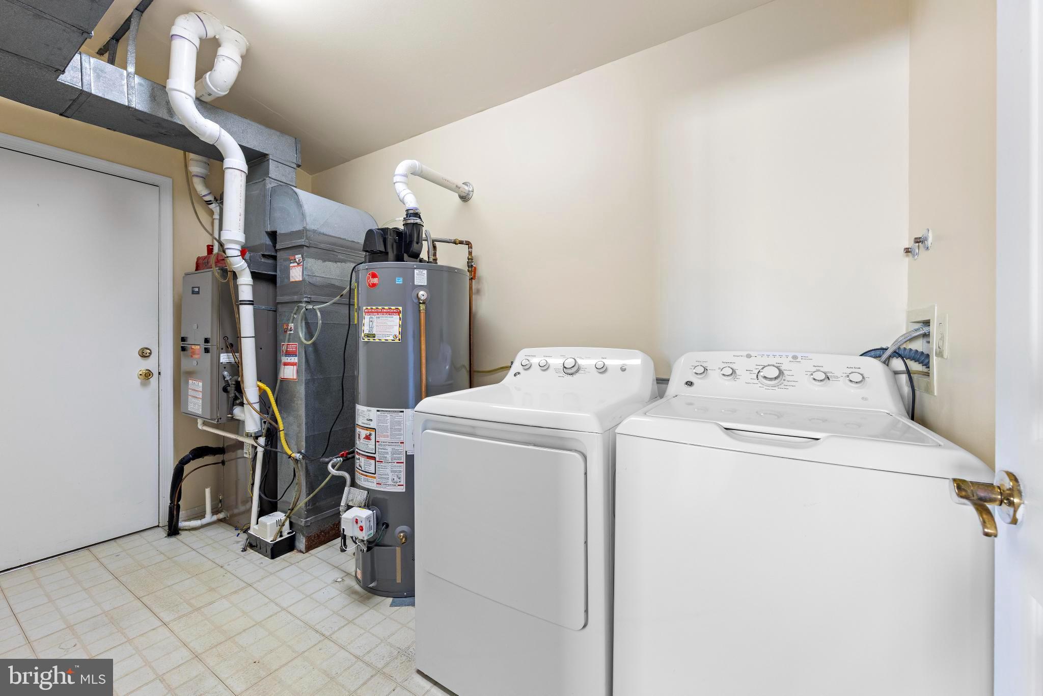 104 Greenwood Lake Road Little Egg Harbor, NJ 08087 - Photo 32 of 43 a view of storage and utility room with washer and dryer