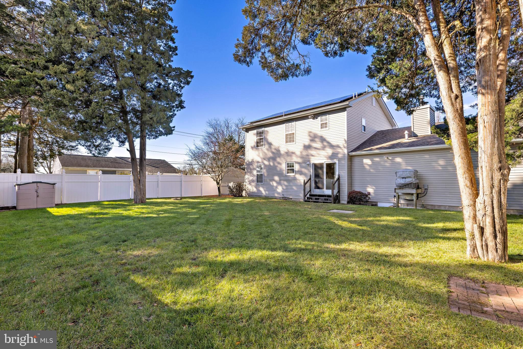 104 Greenwood Lake Road Little Egg Harbor, NJ 08087 - Photo 34 of 43 a view of a house with a big yard and large tree