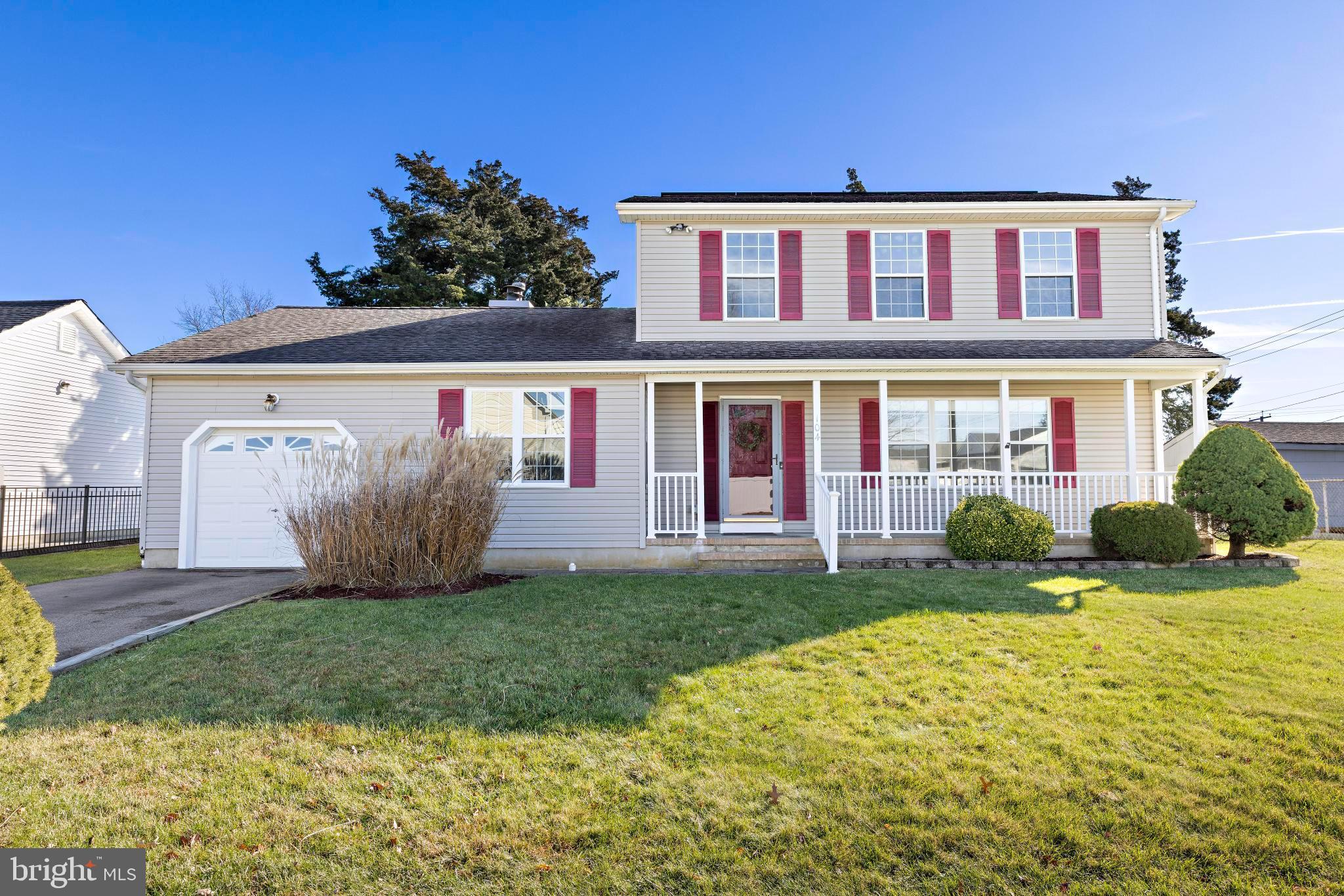 104 Greenwood Lake Road Little Egg Harbor, NJ 08087 - Photo 5 of 43 a front view of house with yard and green space