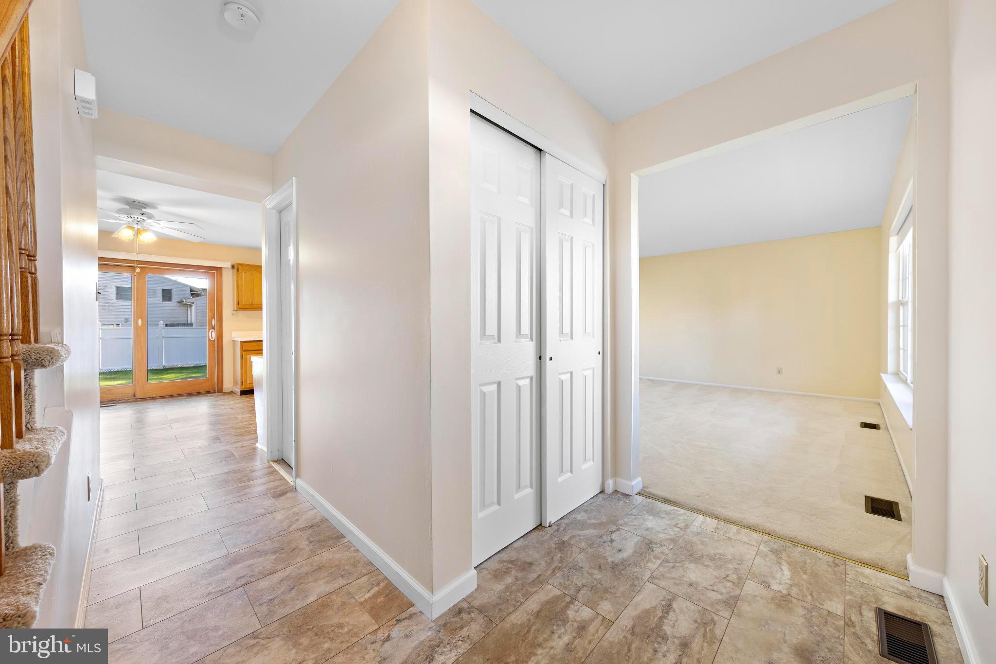104 Greenwood Lake Road Little Egg Harbor, NJ 08087 - Photo 9 of 43 a view of a hallway with wooden floor and closet area
