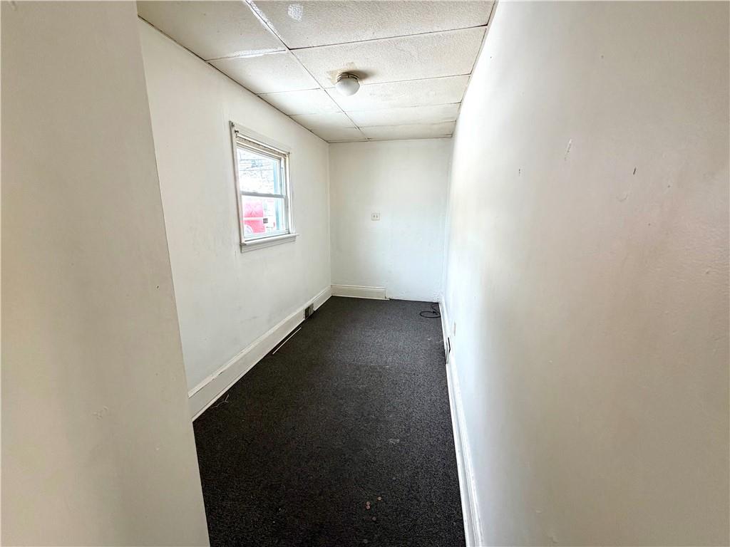 3027 Stayton Street Pittsburgh, PA 15212 - Photo 6 of 17 a view of a hallway with wooden floor