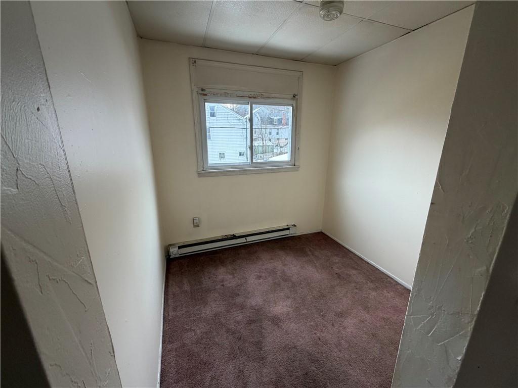 3027 Stayton Street Pittsburgh, PA 15212 - Photo 10 of 17 an empty room with a window