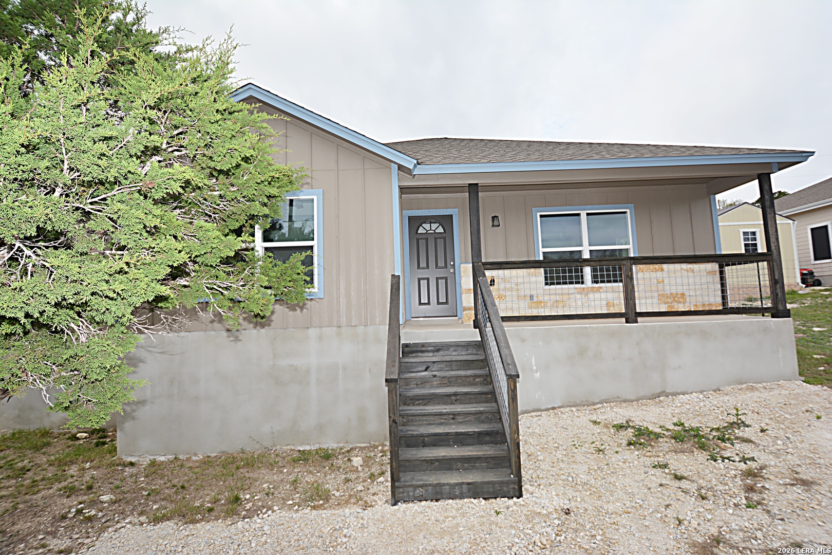 1559 Golf Course Drive Spring Branch, TX 78070 - Photo 1 of 15 a view of a house with a mountain