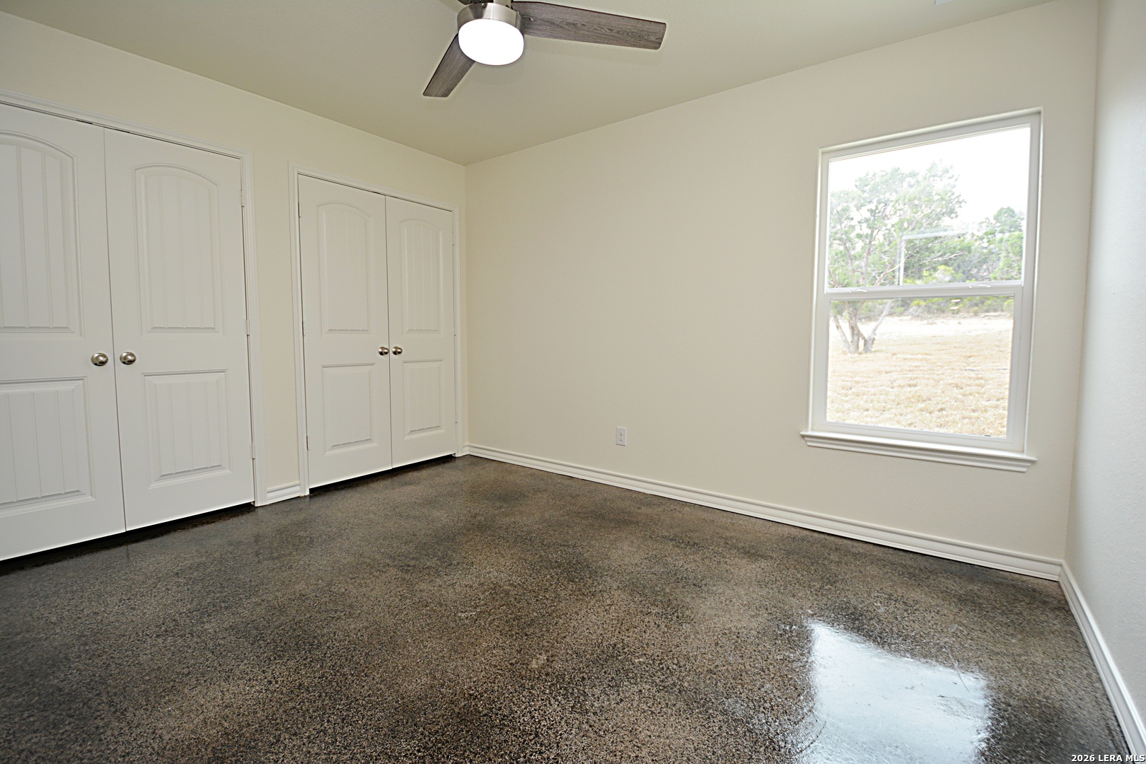 1559 Golf Course Drive Spring Branch, TX 78070 - Photo 14 of 15 an empty room with windows