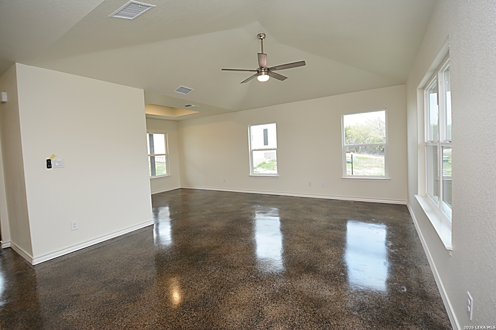 1559 Golf Course Drive Spring Branch, TX 78070 - Photo 4 of 15 a view of an empty room with a window