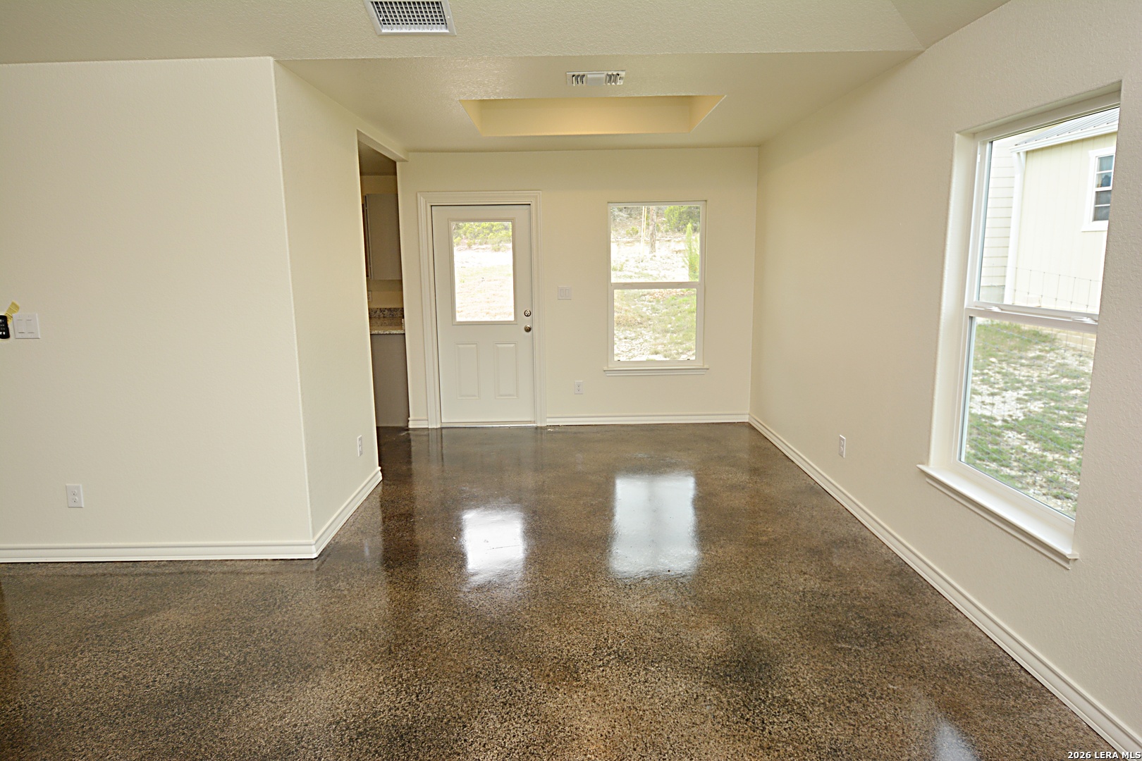 1559 Golf Course Drive Spring Branch, TX 78070 - Photo 5 of 15 a view of empty room with windows