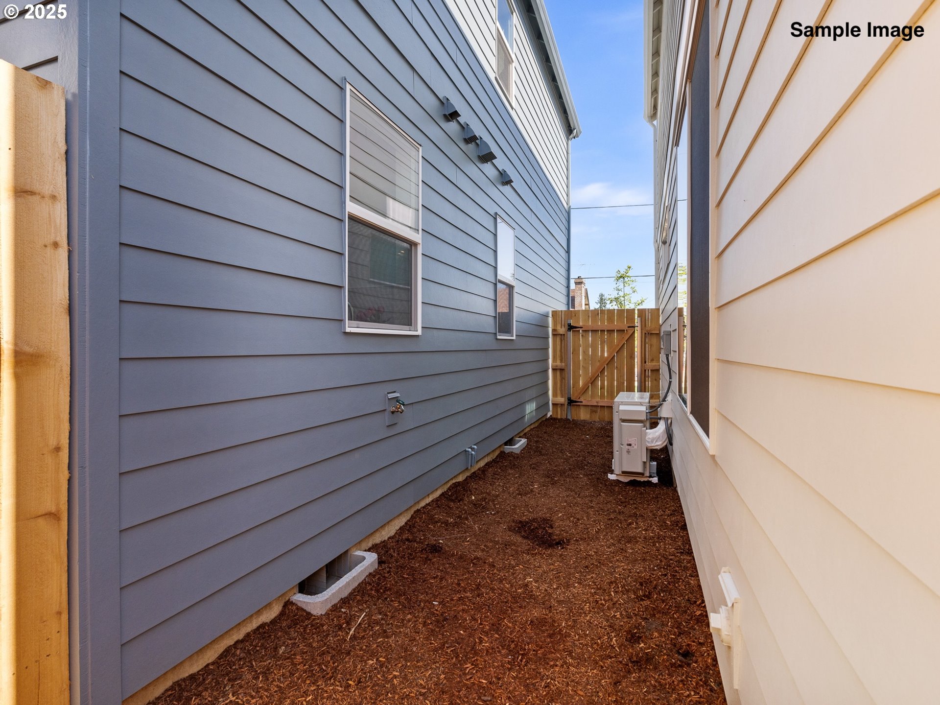 4350 Northeast Going Street Portland, OR 97218 - Photo 14 of 15 a view of house with backyard and wooden fence