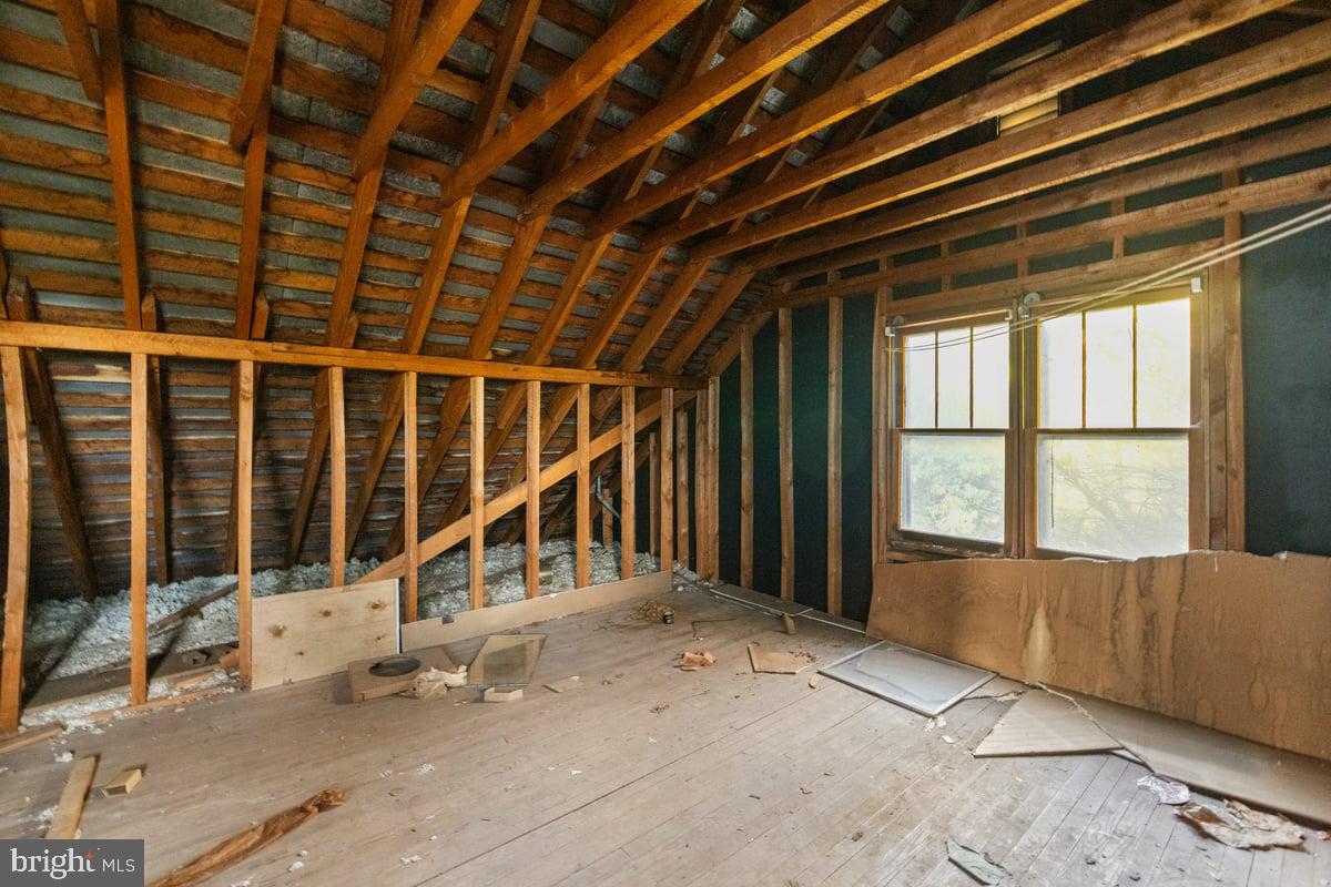 7189 Middle Road Middletown, VA 22645 - Photo 17 of 30 a view of an empty room with wooden floor and windows