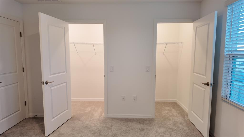 3240 Skyline Loop Kissimmee, FL 34758 - Photo 15 of 26 an empty room with windows
