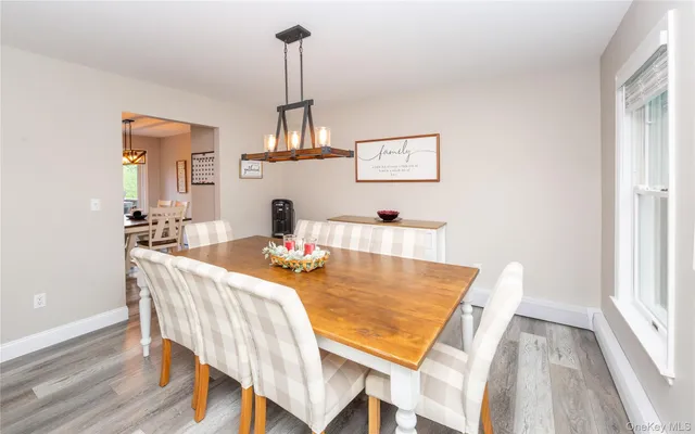 a view of a dining room with furniture