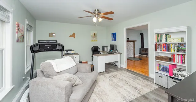 a bedroom with furniture and a chandelier