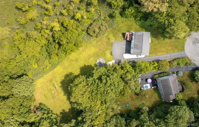 a view of a garden with houses