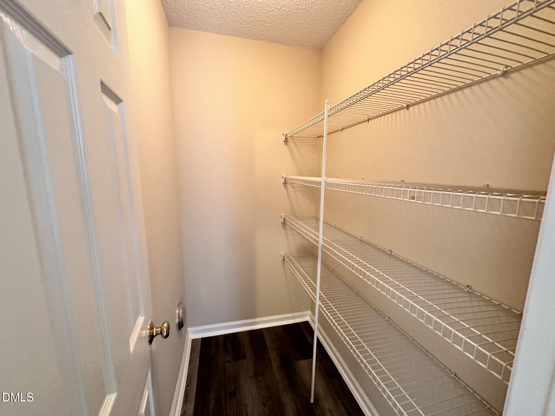 2112 Walnut Bluffs Lane Raleigh, NC 27610 - Photo 10 of 18 a view of walk in closet