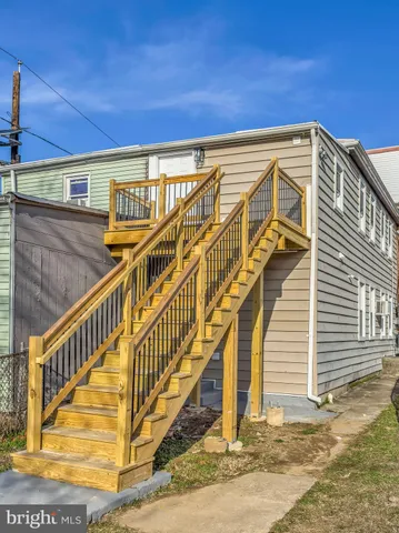 a view of a building with wooden stairs