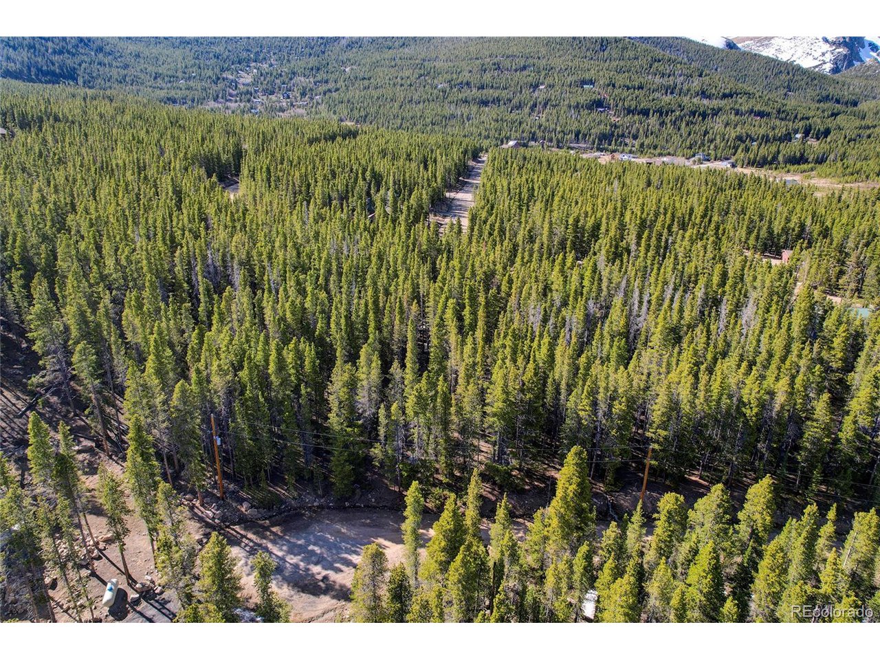 171 Lower Forest Road Idaho Springs, CO 80452 - Photo 10 of 30 a view of an outdoor space with a lake view