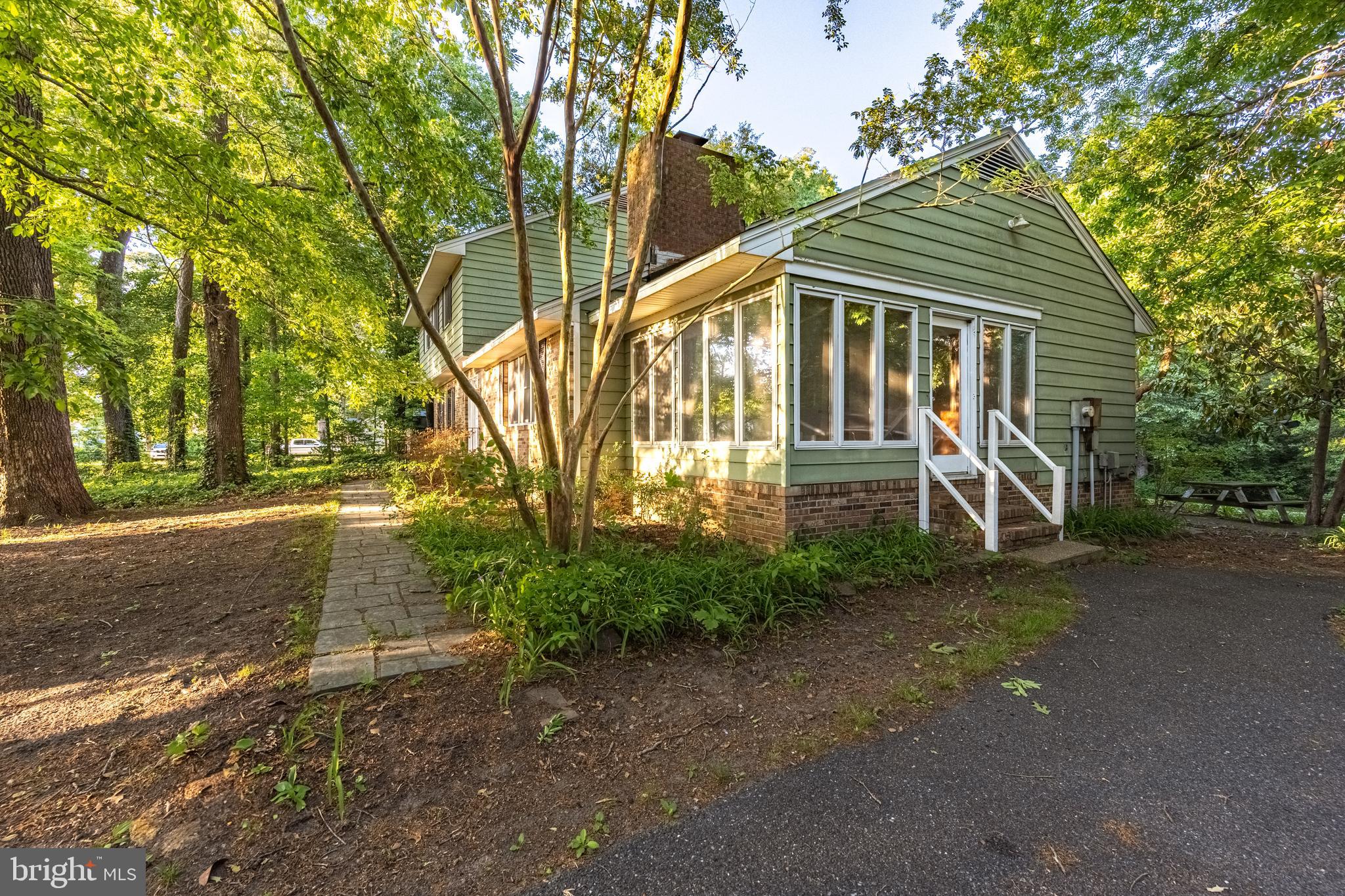 6181 Rockawalkin Road Salisbury, MD 21801 - Photo 64 of 65 a front view of a house with a yard