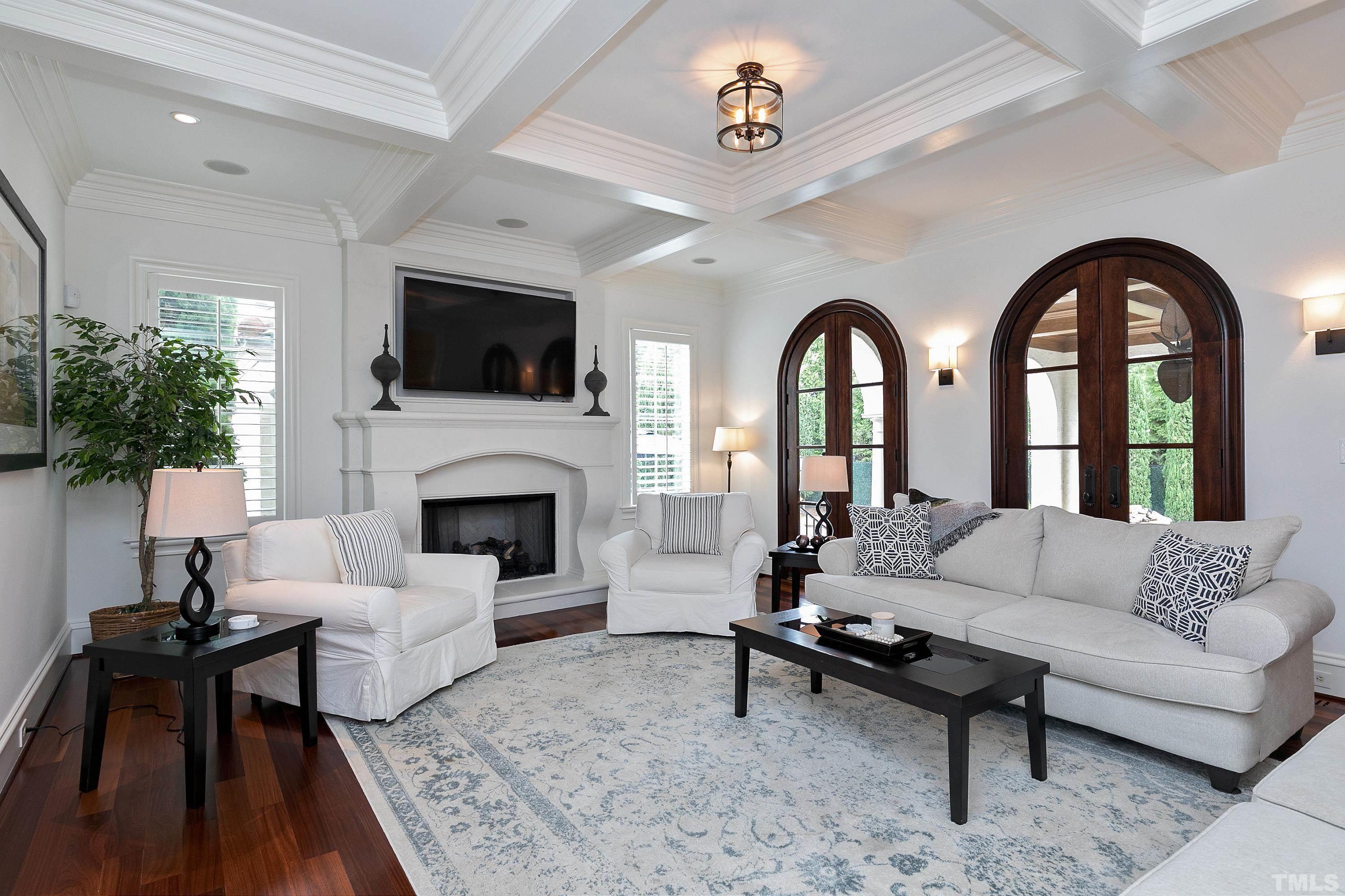 3725 Rolston Drive Raleigh, NC 27609 - Photo 2 of 6 Open to the kitchen, this stunning family room over looks the pool and outdoor covered patio /entertaining area.