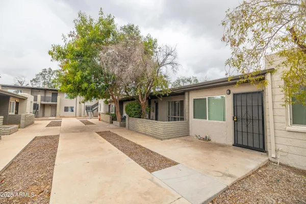 front view of a house with a patio