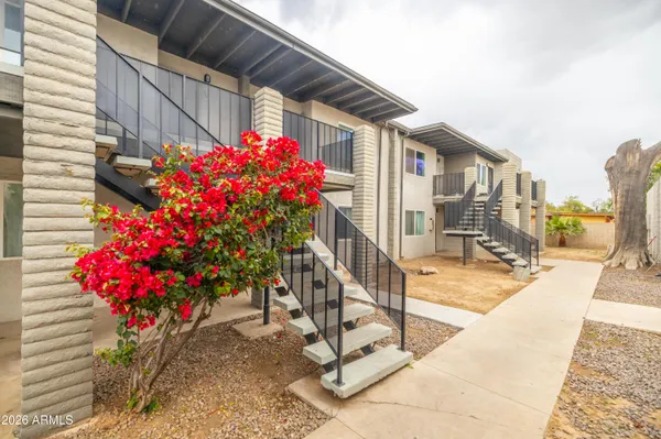 a view of a porch with sitting area