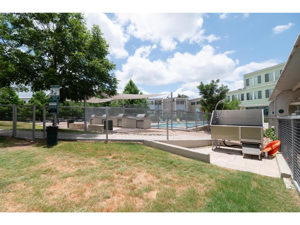 604 North Bluff Drive, Unit 125 Austin, TX 78745 - Photo 27 of 28 a swimming pool with outdoor seating and garden