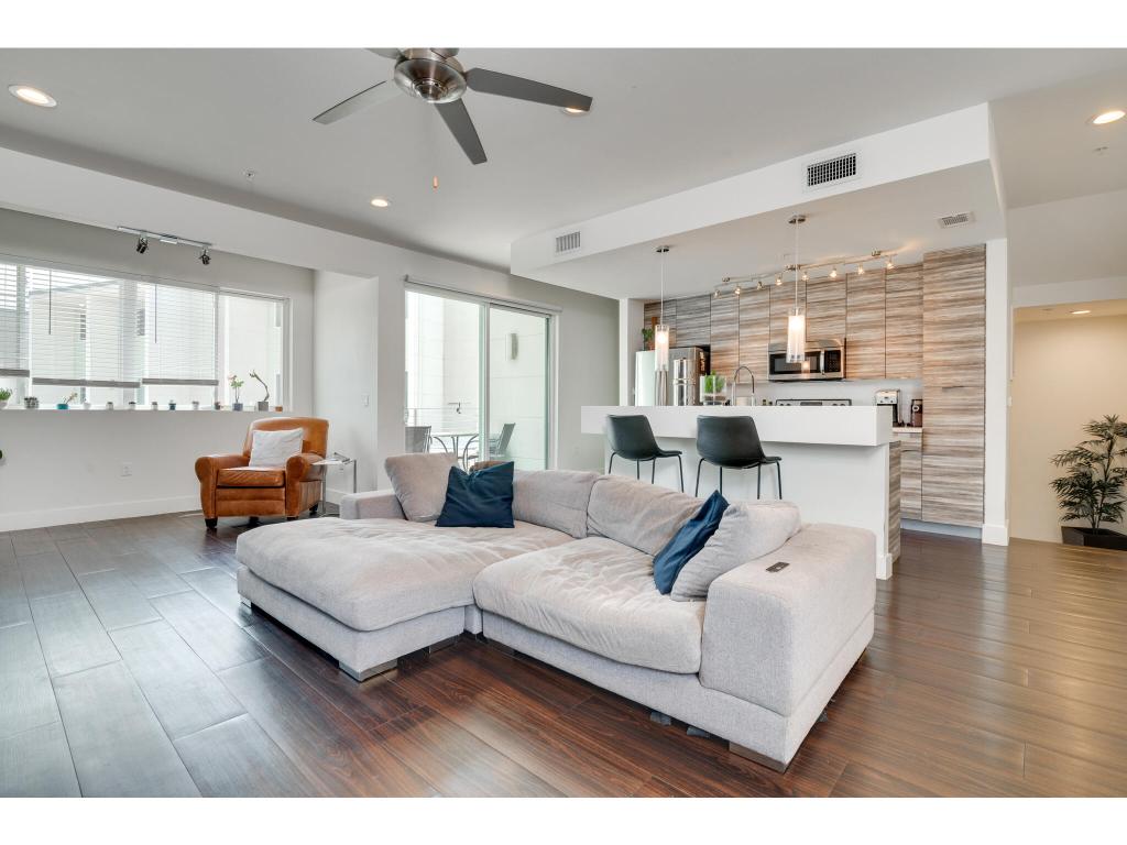 604 North Bluff Drive, Unit 125 Austin, TX 78745 - Photo 9 of 28 a living room with furniture and kitchen view