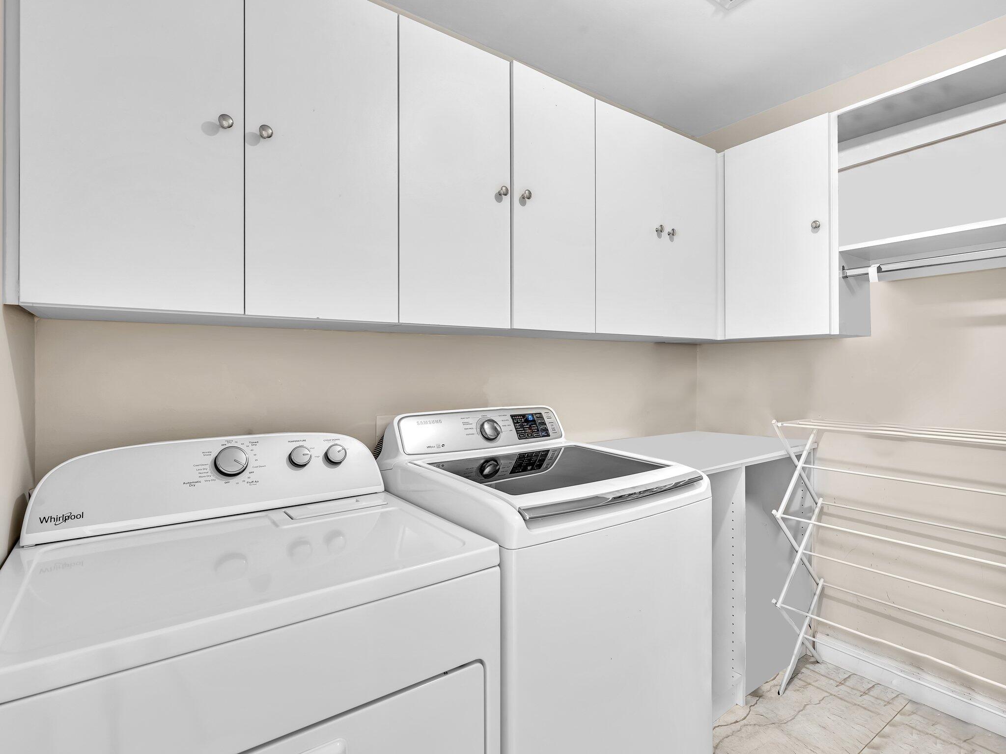 6400 Via Rosa Boca Raton, FL 33433 - Photo 53 of 81 a utility room with dryer and washer