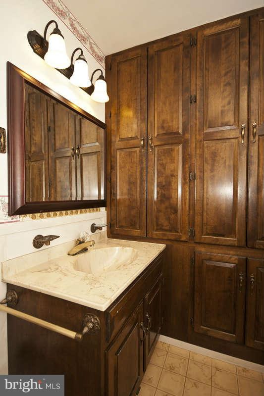 8209 Thornton Road Towson, MD 21204 - Photo 14 of 24 Hall Bath with Tons of Storage