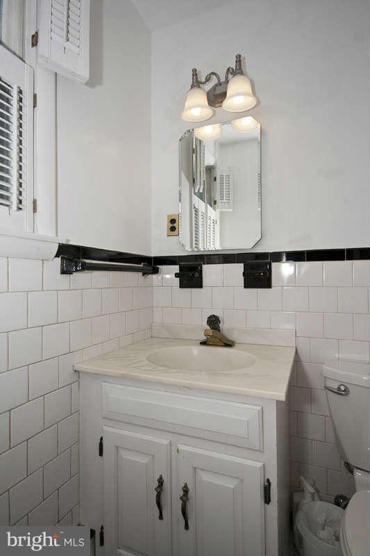 8209 Thornton Road Towson, MD 21204 - Photo 10 of 24 Classic Black and White Master Bath w/Shower Stall