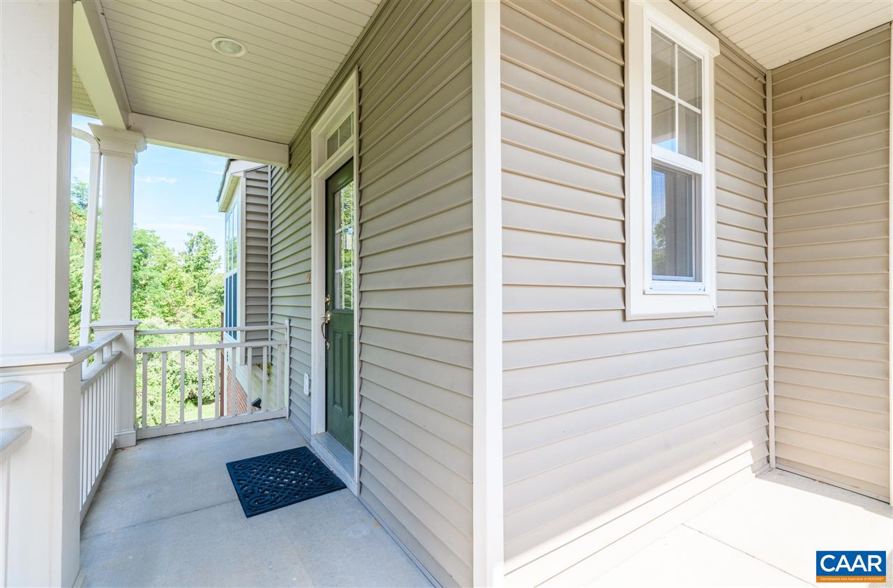 1313 Stoney Ridge Road Charlottesville, VA 22902 - Photo 36 of 38 a view of a porch with a door
