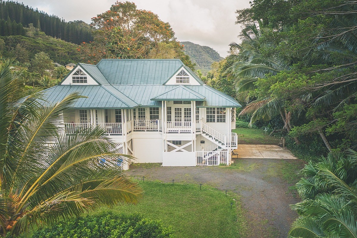 5851 Lokelani Road Kapaa, HI 96746 - Photo 1 of 21 a view of a house with pool and chairs