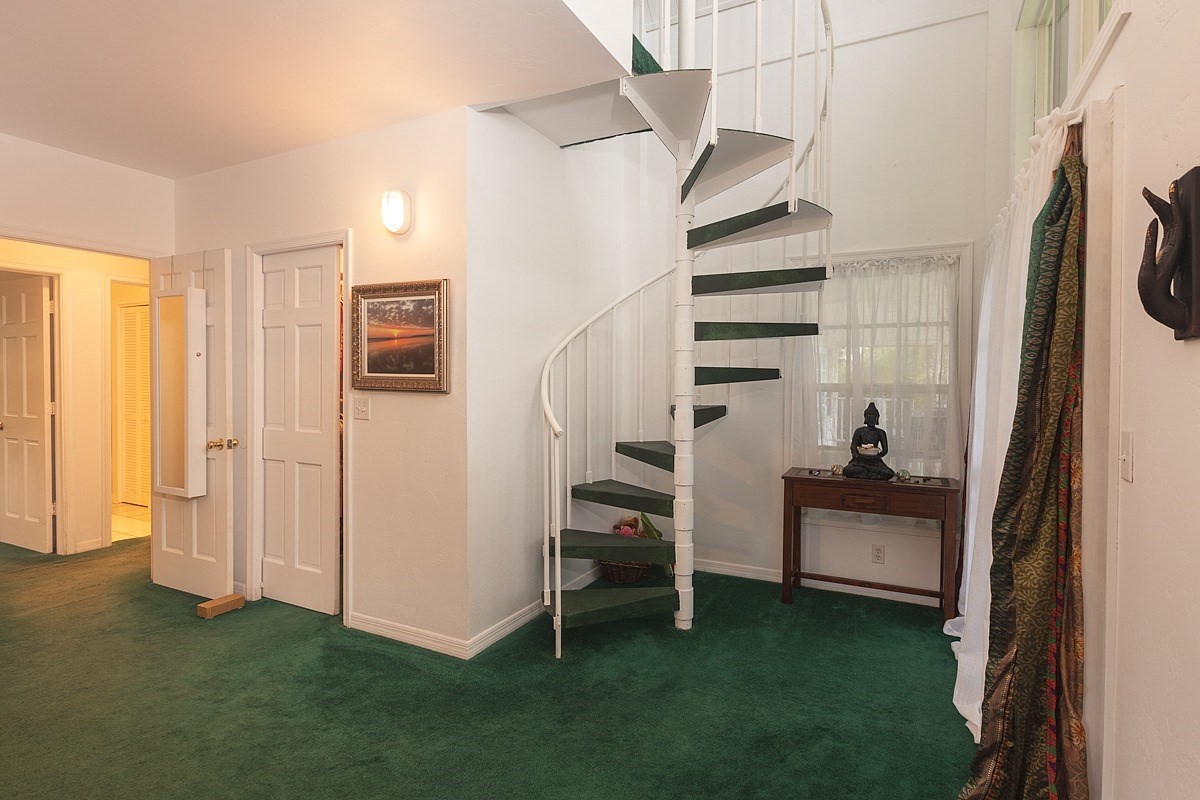 5851 Lokelani Road Kapaa, HI 96746 - Photo 13 of 21 a view of hallway with stairs and furniture