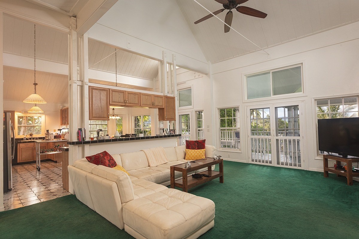 5851 Lokelani Road Kapaa, HI 96746 - Photo 4 of 21 a living room with furniture and a flat screen tv