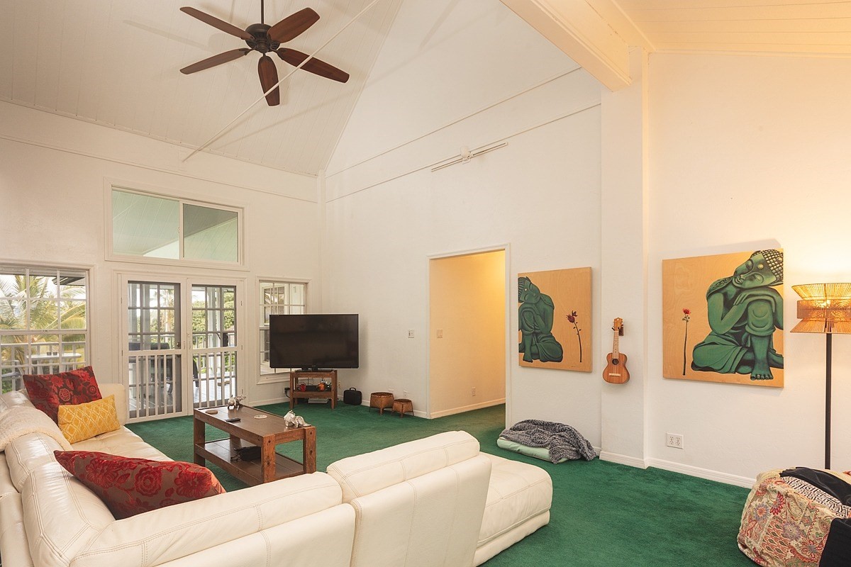 5851 Lokelani Road Kapaa, HI 96746 - Photo 5 of 21 a living room with furniture and a flat screen tv