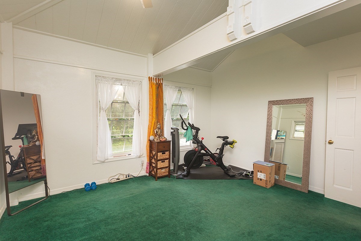5851 Lokelani Road Kapaa, HI 96746 - Photo 8 of 21 a view of a room with gym equipment and windows