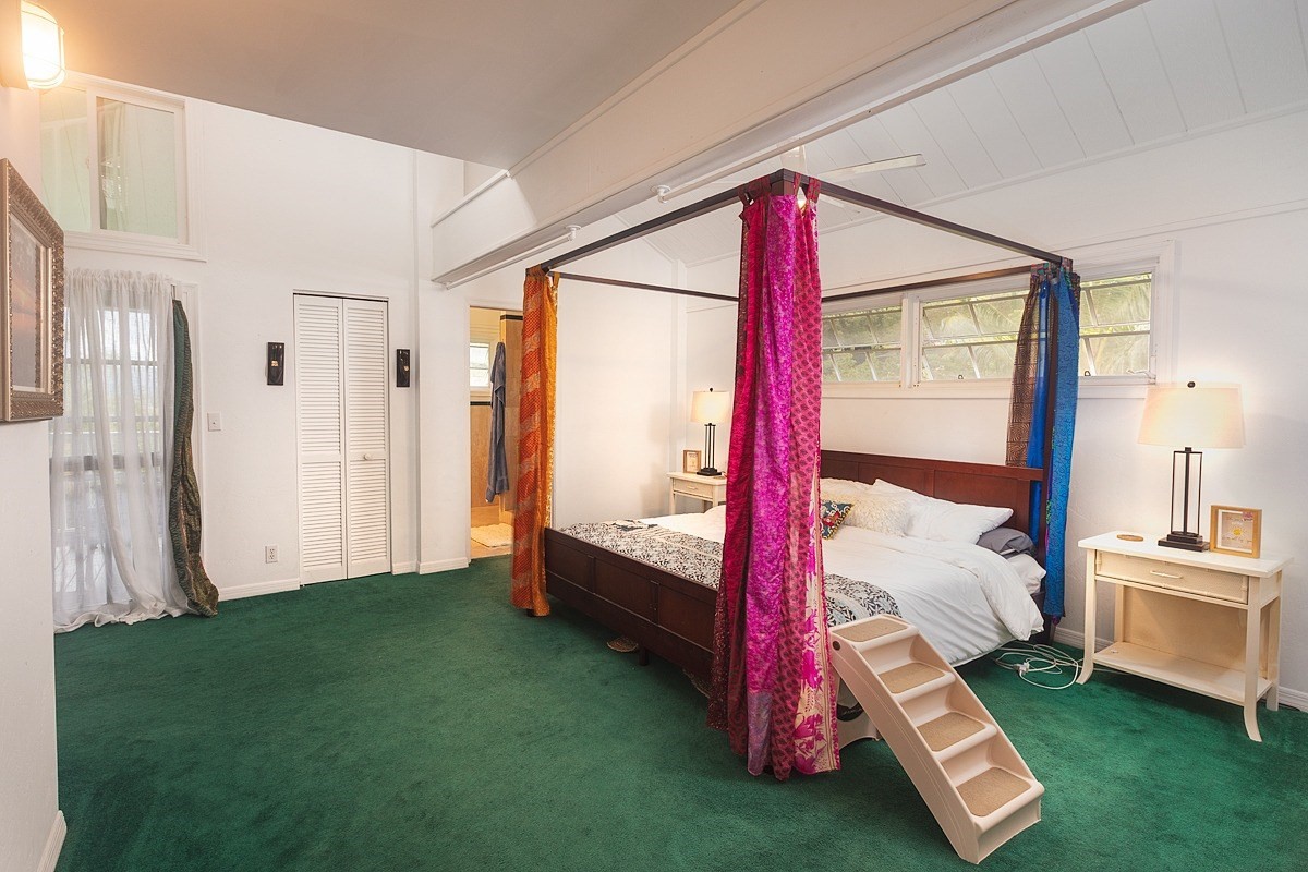 5851 Lokelani Road Kapaa, HI 96746 - Photo 10 of 21 a bed room with a bed and a window