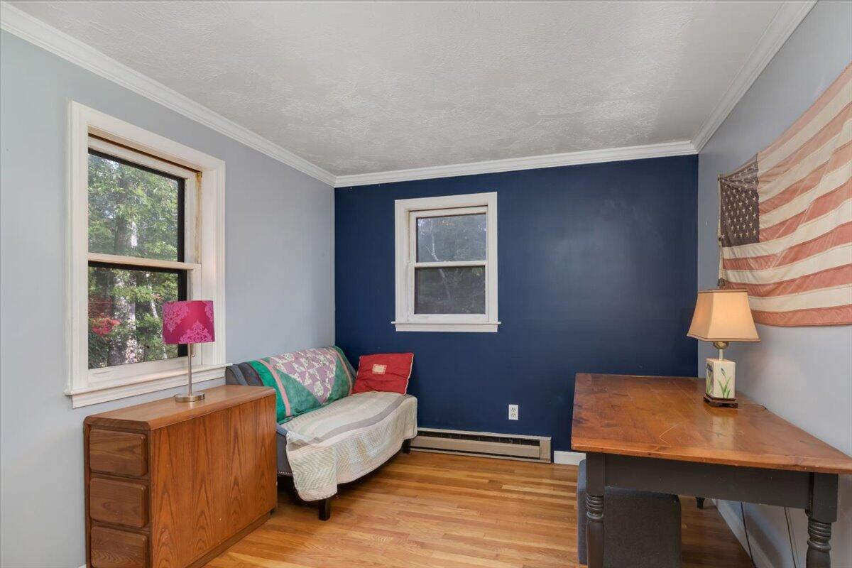 41 Service Road East Sandwich, MA 02537 - Photo 11 of 38 a living room with furniture and a window