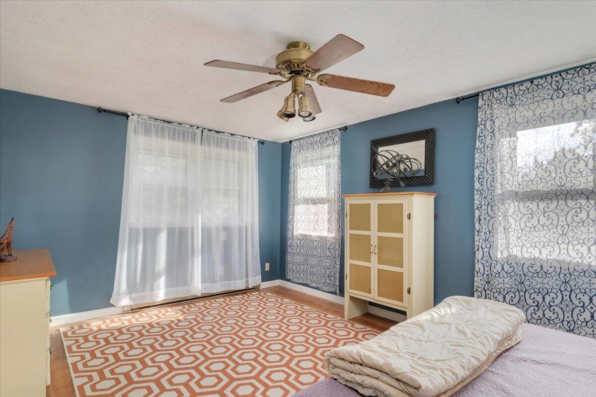 41 Service Road East Sandwich, MA 02537 - Photo 15 of 38 a bedroom with furniture and window