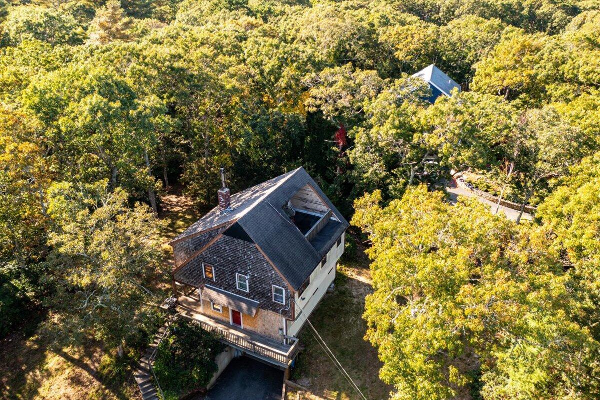 41 Service Road East Sandwich, MA 02537 - Photo 2 of 38 view of a house with a yard and sitting area
