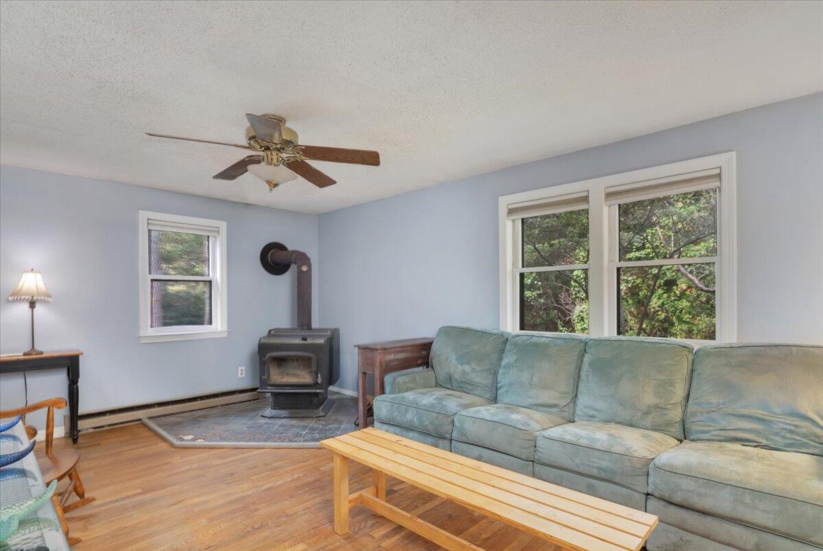 41 Service Road East Sandwich, MA 02537 - Photo 8 of 38 a living room with furniture and a window