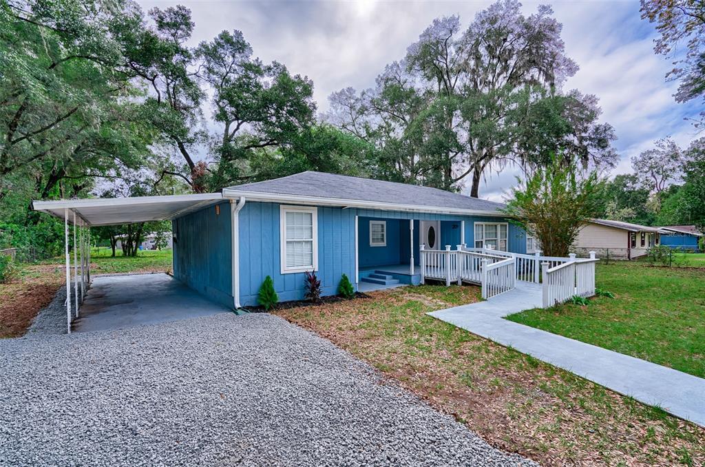 209 Southeast 47th Street Gainesville, FL 32641 - Photo 24 of 29 a view of a house with a yard patio and a patio