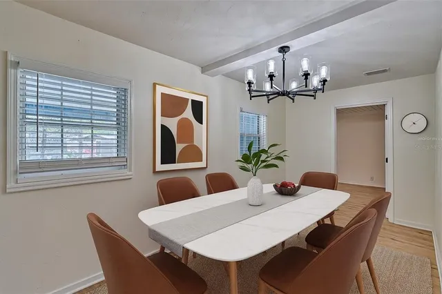 a view of a livingroom with wooden floor