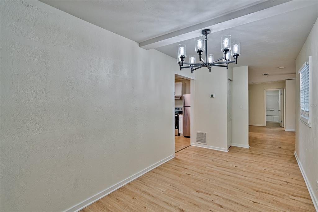 209 Southeast 47th Street Gainesville, FL 32641 - Photo 6 of 29 a view of a livingroom with wooden floor
