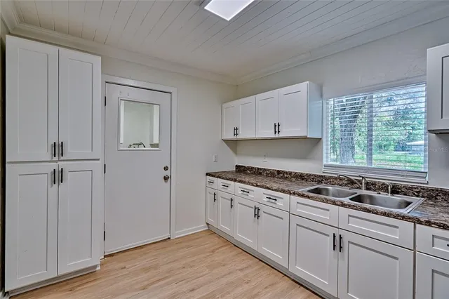 a view of storage and utility room with washer and dryer