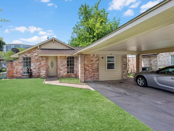 a view of a house with a patio