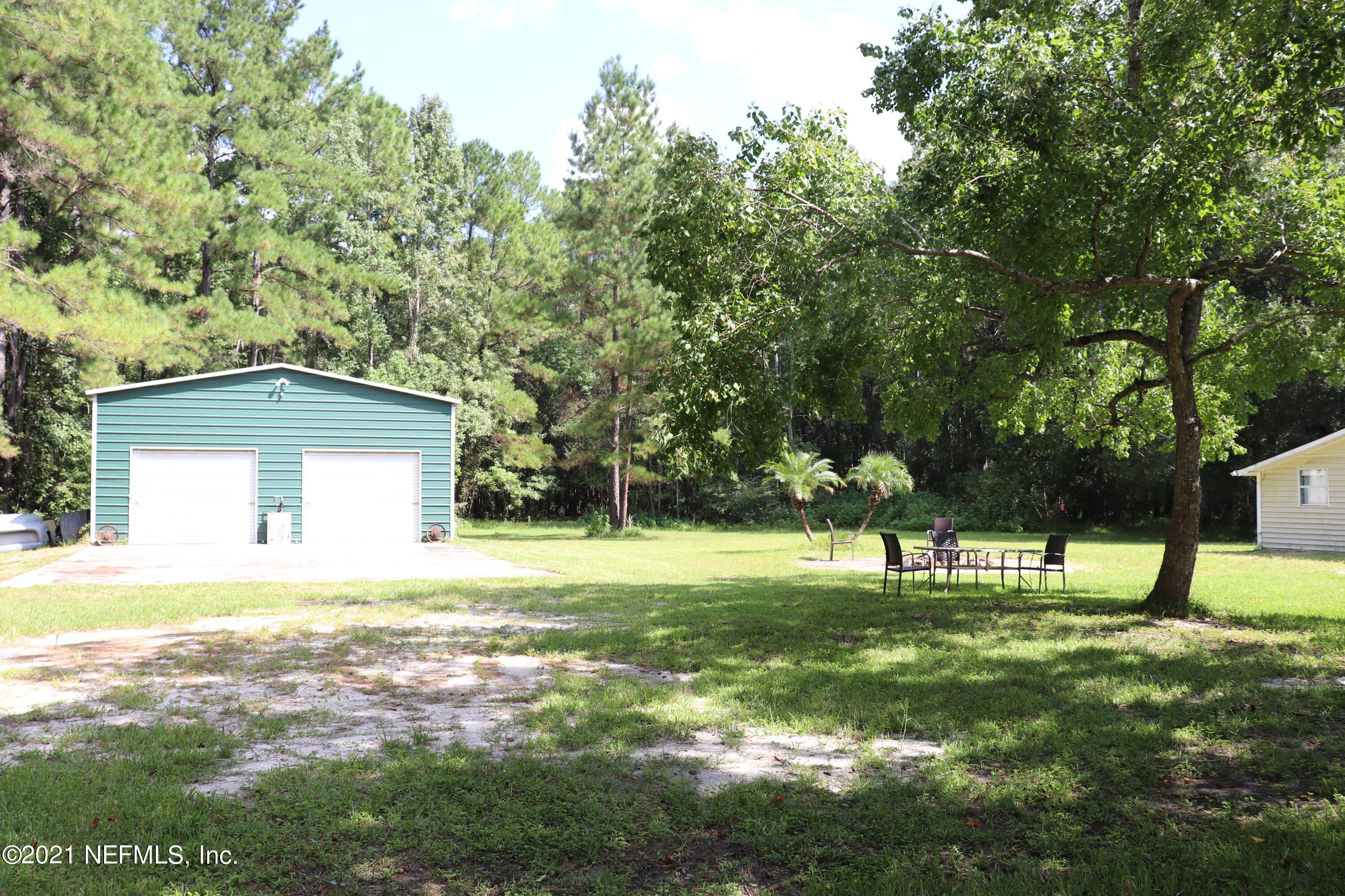 8539 Thomas Road Jacksonville, FL 32219 - Photo 34 of 38 garage & firepit