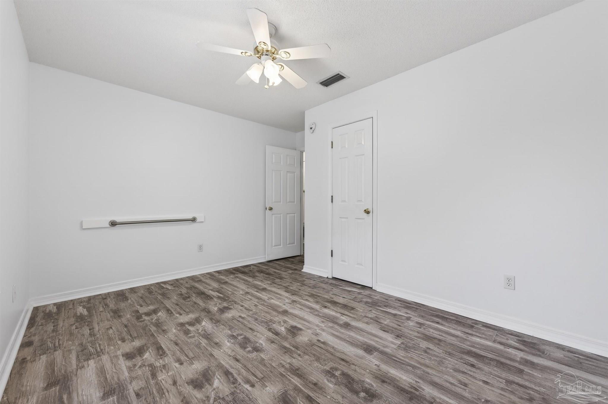 4885 Mayo Circle Pace, FL 32571 - Photo 31 of 44 wooden floor in an empty room