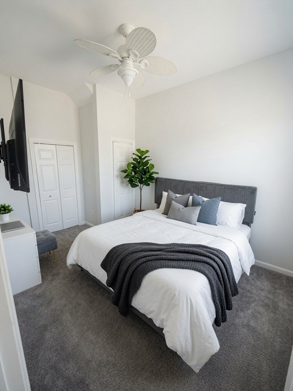 37 Madison Street, Unit 37 Malden, MA 02148 - Photo 5 of 10 a bedroom with a bed and a chandelier