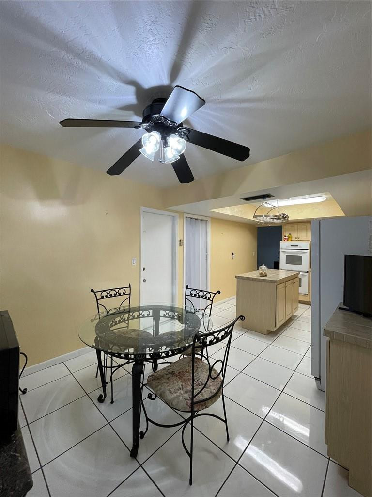 9200 Southwest 55th Street Cooper City, FL 33328 - Photo 13 of 23 Eat-In Kitchen & Garage Entry Door