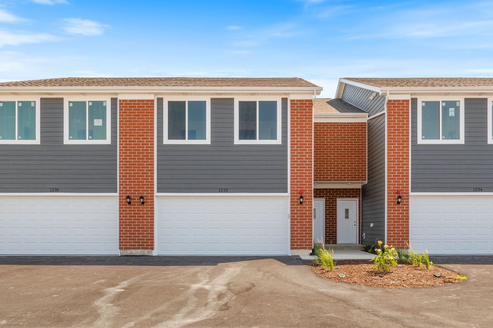 1236 Gillespie Lane Yorkville, IL 60560 - Photo 1 of 20 a front view of house with garage